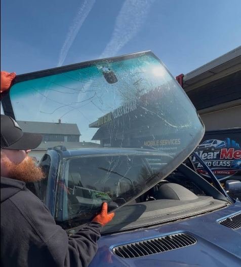 Mobile windshield replacement in progress
